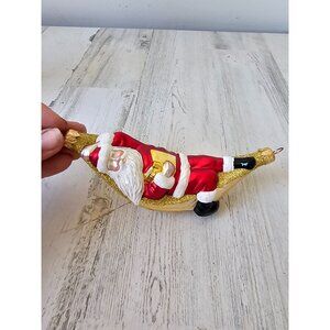 Patricia breen Santa respite ornament red sleeping hammock book glitter ornament